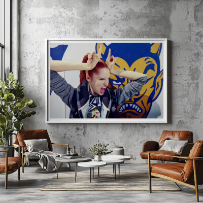 Framed portrait of 'Devil's Expression' by Liäns Jadän, displayed in a modern space with large windows and urban vibes.