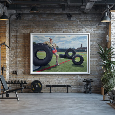 Framed portrait of 'Power Play' by Liäns Jadän, displayed in a modern gym space with brick walls and workout equipment.